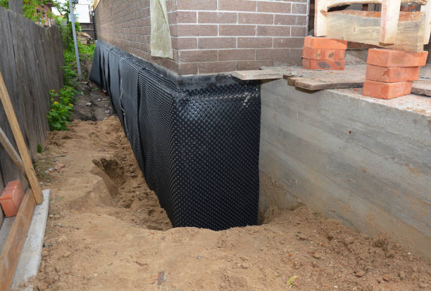 SJ Waterproofing Pros technician performing targeted Vapor Barrier Installation assessment in Amo, IN